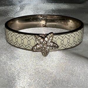 Coach Hinged Bangle Jewelry Bracelet with Silver Hardware and Starfish Accent